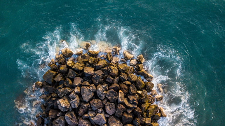 La sorprendente técnica para evitar el exceso de CO2: triturar rocas hasta convertirlas en polvo